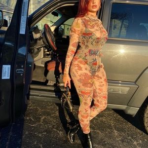 Notoriousfly sheer tattoo catsuit